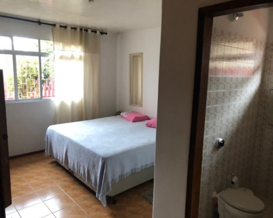 EXTRAJUDICIAL Leilão de Casa com 200m² de área construída em Curitiba/PR, localizado em Curitiba - PR, bairro Uberaba